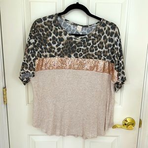 7th Ray. Never worn. Size Small. Fits like a Medium. Fun top!